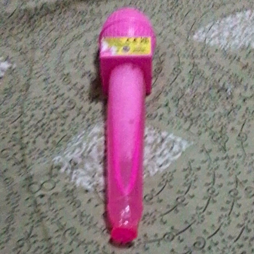 Pink handheld toy microphone - handheld,